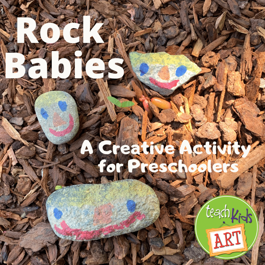 This is a photo of 3 small rocks, with cute faces drawn on them by a preschooler